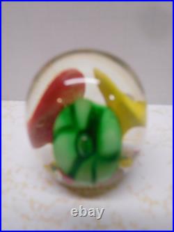 Beautiful small Art Glass Paperweight Egg Green, Yellow & Red on 3 Flowers