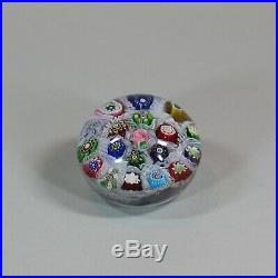 Clichy millefiori chequer paperweight, circa 1850, set with variously assorted c