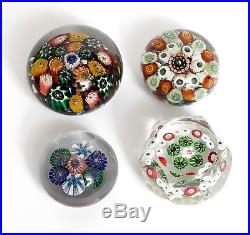 FOUR ANTIQUE AND LATER GLASS PAPERWEIGHTS