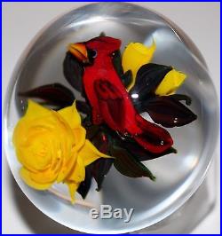 Signed Rick Ayotte Glass Paperweight Cardinal on three yellow roses