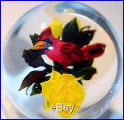 Signed Rick Ayotte Glass Paperweight Cardinal on three yellow roses